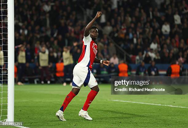 Bukayo Saka of Arsenal celebrates scoring his team's first goal during the UEFA Champions League 2024/25 Semi Final Second Leg match between Paris...