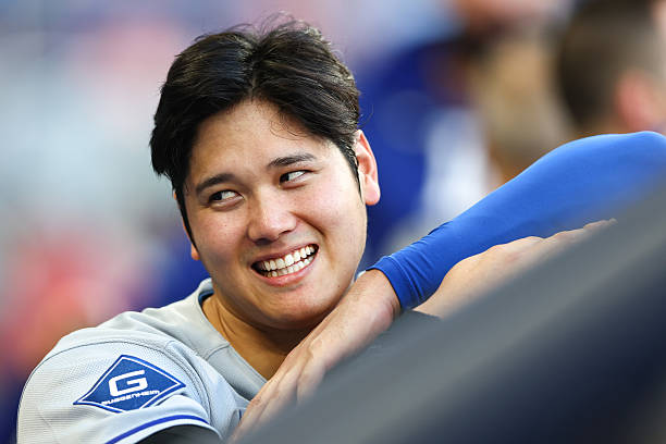Shohei Ohtani of the Los Angeles Dodgers reacts in the sixth inning of the game against the Miami Marlins at loanDepot park on May 07, 2025 in Miami,...