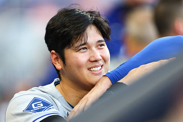 Shohei Ohtani of the Los Angeles Dodgers reacts in the sixth inning of the game against the Miami Marlins at loanDepot park on May 07, 2025 in Miami,...
