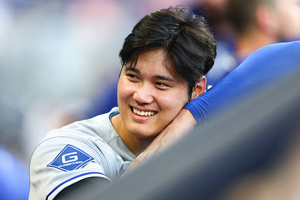 Shohei Ohtani of the Los Angeles Dodgers reacts in the sixth inning of the game against the Miami Marlins at loanDepot park on May 07, 2025 in Miami,...