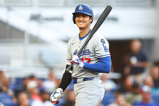 Shohei Ohtani of the Los Angeles Dodgers reacts in the sixth inning of the game against the Miami Marlins at loanDepot park on May 07, 2025 in Miami,...