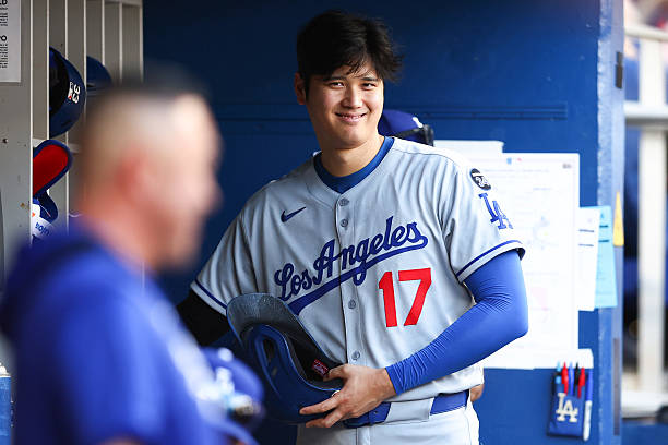 Shohei Ohtani of the Los Angeles Dodgers reacts in the dugout against the Miami Marlins in the fourth inning at loanDepot park on May 07, 2025 in...
