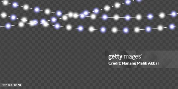 chrismas lights with transparent background - christmas light strand white background stock illustrations