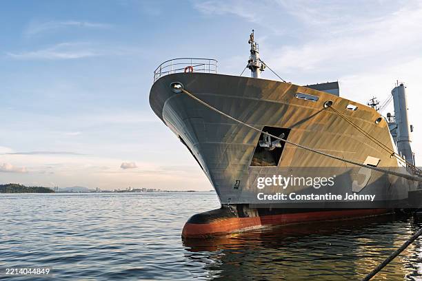 large navy ship at harbor - military ship stock pictures, royalty-free photos & images