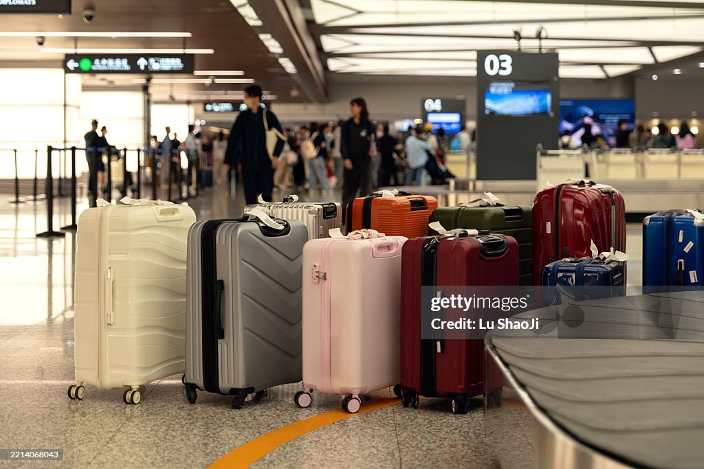 Luggage On Conveyor Belt At Airport.