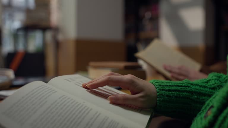 https://media.gettyimages.com/id/2214082403/video/close-up-of-a-girl-moving-her-hand-along-a-row-on-the-pages-while-reading-a-book-in-the.jpg?b=1&s=640x640&k=20&c=wrJR4qkKoixCbPt5B7ALXcXp7IAbXnD0pFDMri8iD8w=