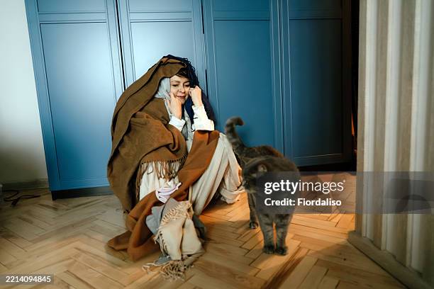 portrait of a happy woman with domestic cat - serotonin stock pictures, royalty-free photos & images