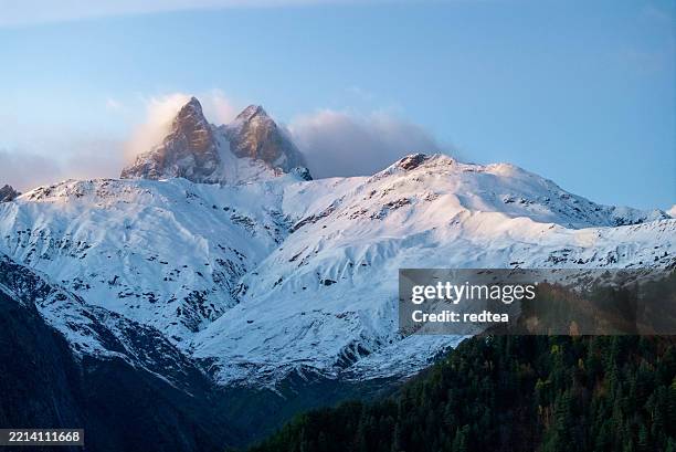 ushba mountain at sunrise near mestia, georgia - caucasus mountains stock pictures, royalty-free photos & images