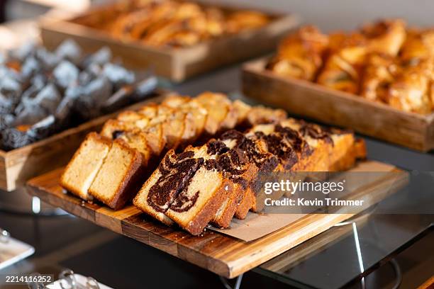 sliced marble and pound cakes - loaf of bread stock pictures, royalty-free photos & images