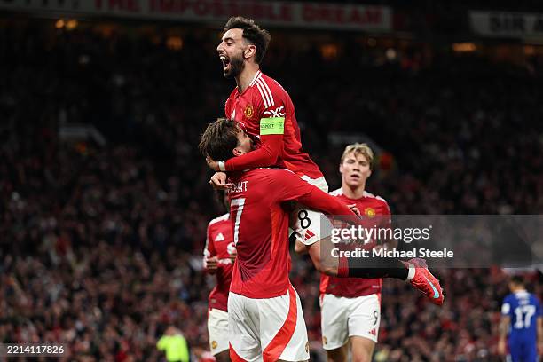 Mason Mount of Manchester United celebrates scoring his team's first goal with teammate Bruno Fernandes during the UEFA Europa League 2024/25 Semi...