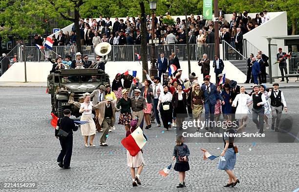 Military parade is in progress during a ceremony to honor the 80th anniversary of the end of World War II in Europe at the Esplanade Charles de...
