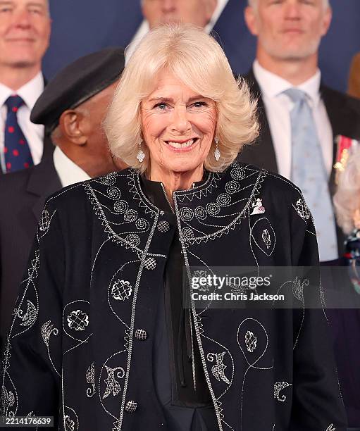 Queen Camilla smiles at a concert to mark the 80th Anniversary of VE Day at Horse Guards Parade on May 08, 2025 in London, England. The King and...