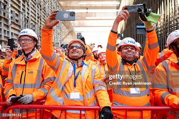 Workers record the Mary Ann breaking through on May 09, 2025 in Birmingham, England. The tunnel boring machine nick-named 'Mary Ann' has completed...