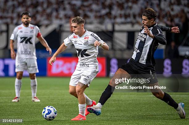 Benjamín Rollheiser of Santos and Pedro Raul of Ceará fight for possession during a Brasileirao 2025 match between Santos and Ceara at Allianz Parque...
