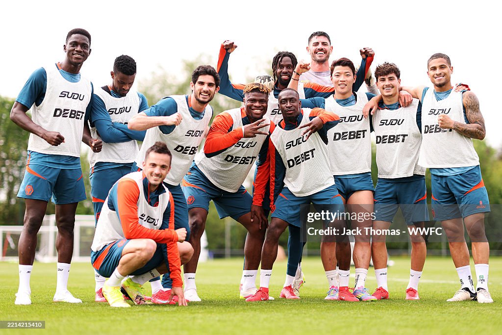 Wolverhampton Squad Players pose for a winning team photo following a Wolverhampton... News ...