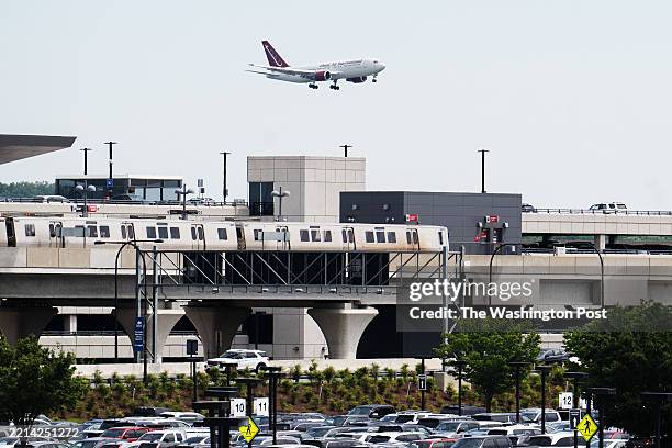 Plane carrying dozens of Afrikaners flies in to Dulles International Airport on May 12, 2025 in Dulles, VA.