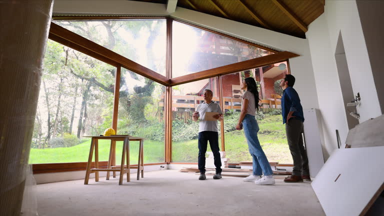 https://media.gettyimages.com/id/2214253330/video/couple-remodeling-their-house-receiving-update-from-the-architect.jpg?b=1&s=640x640&k=20&c=vUwMAhV8Gh60UD0cETTlyqmtaANRHoqg1rbz4K64f4g=
