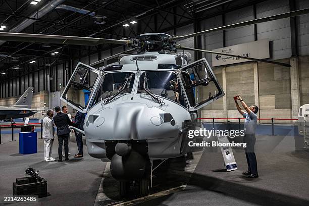 An NH90 tactical transport helicopter at the NHIndustries SAS stand during the FEINDEF defense exhibition in Madrid, Spain, on Monday, May 12, 2025....