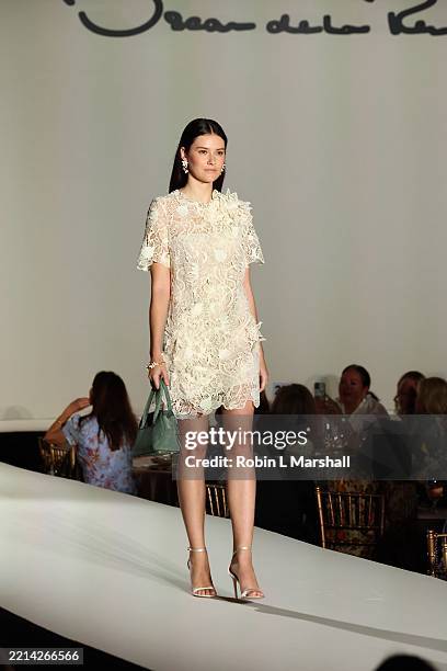 Model walks the runway at The Colleague's Annual Spring Luncheon and Oscar de la Renta Fashion Show at Beverly Wilshire, A Four Seasons Hotel on May...