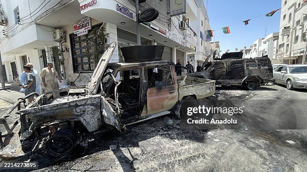 View of destroyed vehicles following the clash between Libyan security forces and the militia group called "Stability Support Apparatus" on the Abu...