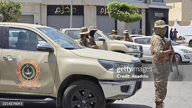 Forces of Libyan Ministry of Defense take security measures following the clash between Libyan security forces and the militia group called...