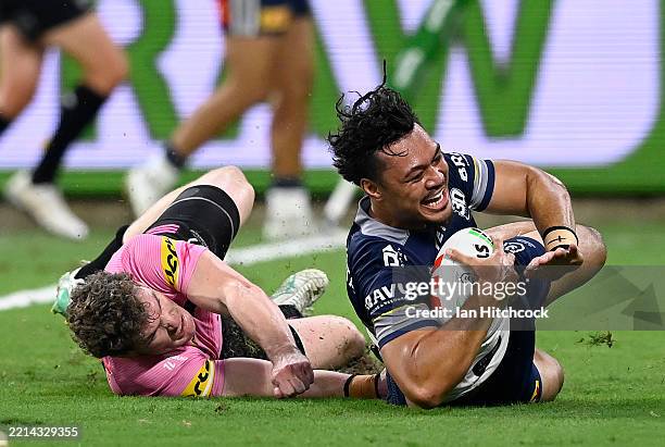 Jeremiah Nanai of the Cowboys scores a try during the round 10 NRL match between North Queensland Cowboys and Penrith Panthers at Queensland Country...