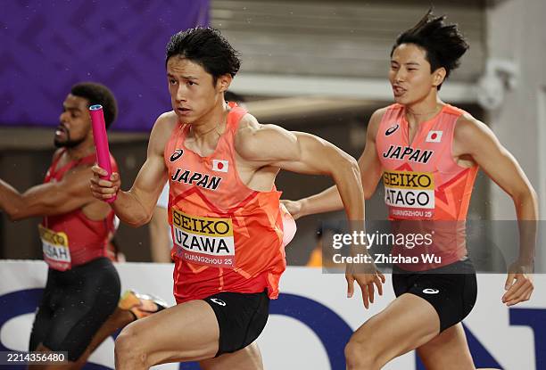 Towa Uzawa of Team Japan takes off after Rai Atago of Tam Japan in the Men's 4x100 Metres Relay during day one of the World Athletics Relays...
