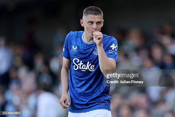Vitaliy Mykolenko of Everton celebrates scoring his team's first goal during the Premier League match between Fulham FC and Everton FC at Craven...