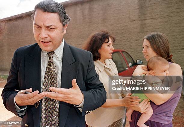 El vicepresidente de la Camara de Diputados de Chile, Jaime Naranjo Ortiz, hace declaraciones a la prensa mientras Begona Ojeda, hija de la chilena...
