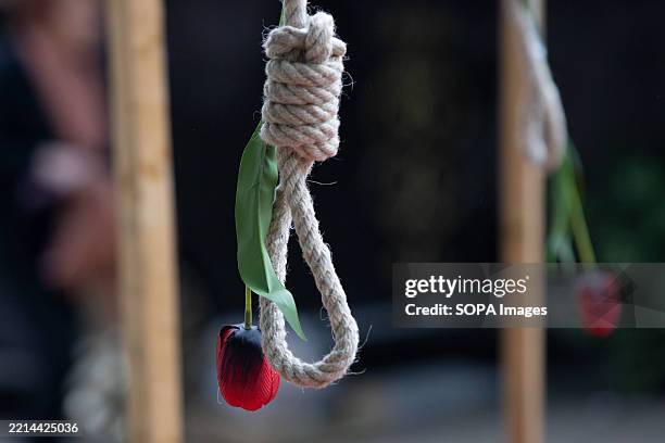 Hanging rope seen displayed during the rally. Supporters of the National Council of Resistance of Iran and Franco-Iranian associations organize a...