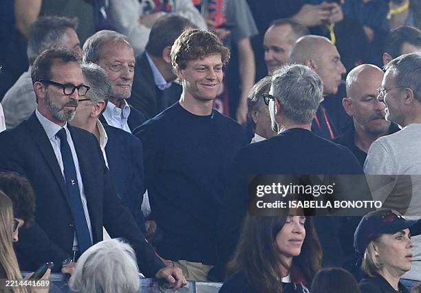 Italian tennis star Jannik Sinner attends on the tribune during the Italian Cup final football match between AC Milan and Bologna at the Olympic...