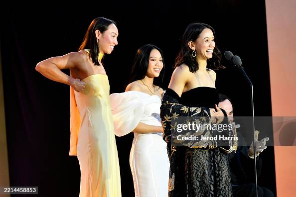 Atsof Honorees Torri Huske, Suni Lee, and Lee Kiefer of Team USA accept an ...