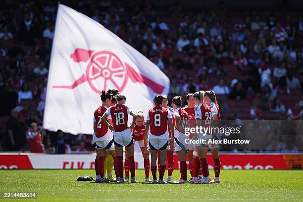 The Arsenal team form a huddle ahead of the start of the second half during the Barclays Women's Super League match between Arsenal FC and Manchester...