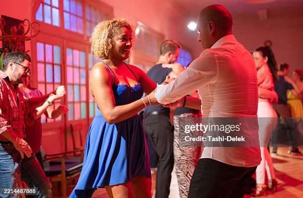 professional dance couple training in the evening - bachata stock pictures, royalty-free photos & images