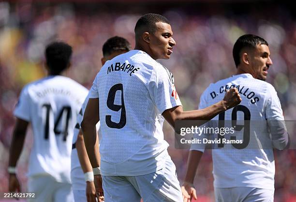 Kylian Mbappe of Real Madrid celebrates scoring his team's first goal from the penalty spot during the LaLiga match between FC Barcelona and Real...