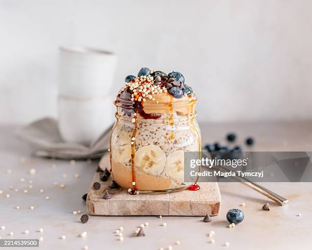 peanut butter banana oatmeal in a jar - porridge stock pictures, royalty-free photos & images