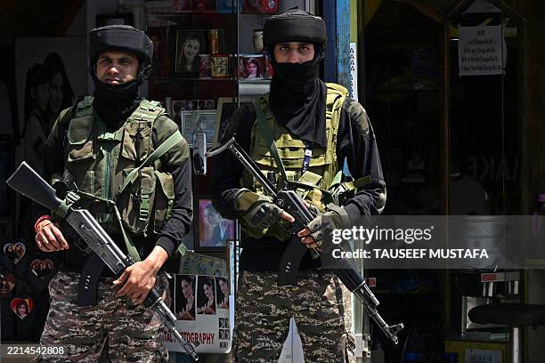 Indian paramilitary troopers stand guard along a street in Srinagar on May 15, 2025. Pakistan's nuclear arsenal should be under the surveillance of...