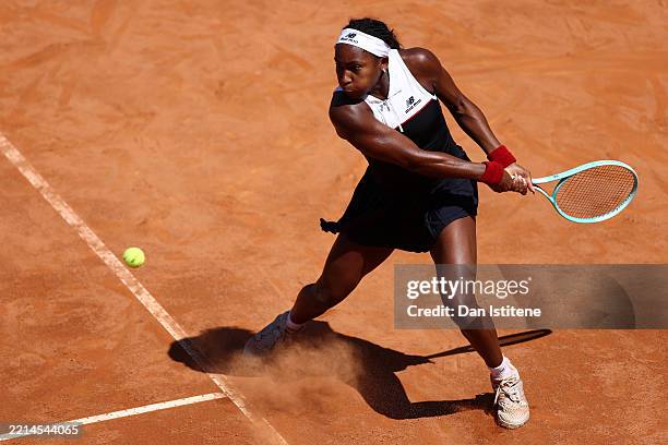 Coco Gauff of United States plays a backhand during her Women's Singles Third Round match against Magda Linette of Poland on Day Seven of the...