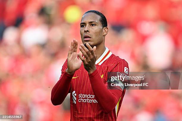 Virgil van Dijk of Liverpool acknowledges the fans after the Premier League match between Liverpool FC and Arsenal FC at Anfield on May 11, 2025 in...