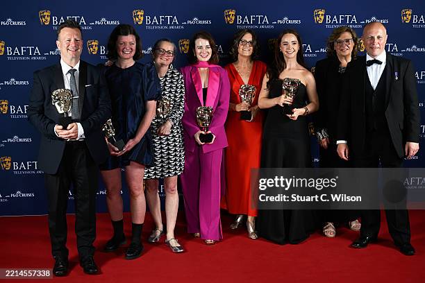 Alison Howe, Janet Fraser Crook and members of cast and crew pose with the Live Event Coverage Award for 'Glastonbury 2024' inside the Winners Room...
