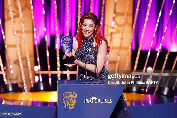 Dianne Buswell accepts the P&O Cruises Memorable Moment Award for 'Strictly Come Dancing' onstage during the 2025 BAFTA Television Awards with P&O...