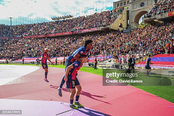 Fermin Lopez of FC Barcelona celebrates with his team mate Alejandro Balde their team's fifth goal which was disallowed after during the LaLiga match...