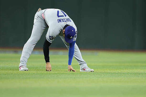 Shohei Ohtani of the Los Angeles Dodgers warms up before the MLB game against the Arizona Diamondbacks at Chase Field on May 11, 2025 in Phoenix,...