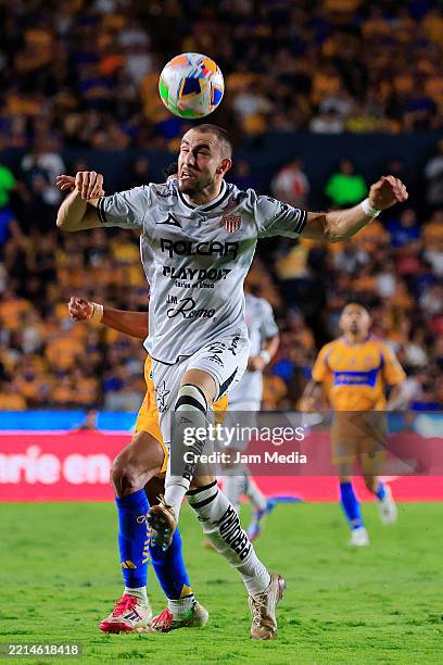 Alejandro Mayorga of Necaxa heads the ball during the quarterfinals second-leg match between Tigres UANL and Necaxa as part of the Torneo Clausura...