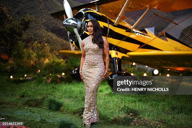 Actress Angela Bassett poses on the red carpet upon arrival for the Global Premiere of "Mission: Impossible - The Final Reckoning" at Leicester...