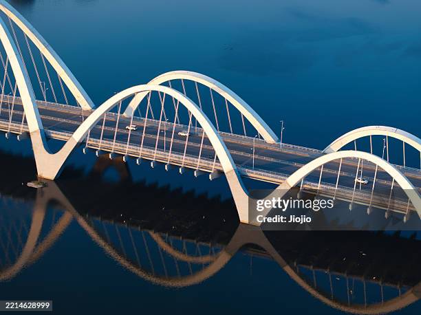 modern bridge at sunset - angle stock pictures, royalty-free photos & images