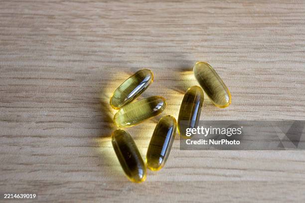 Omega 3 fish oil capsules are on display on a table in Lisbon, Portugal, on May 15, 2025.