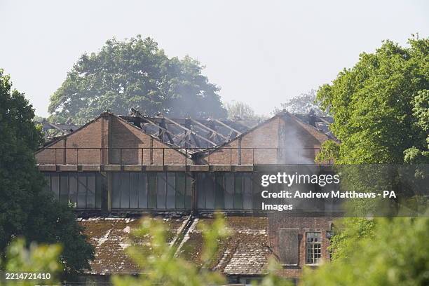 Damaged buildings following a fire where two firefighters and a member of the public have died, two firefighters were also seriously injured at...