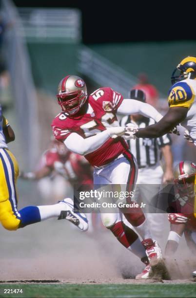 Defensive lineman Chris Doleman of the San Francisco 49ers pursues the football during the 49ers 34-0 victory over the St. Louis Rams at 3Com park at...