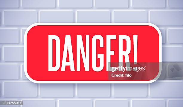 danger red sign button brick wall background - osha hazard communication pictogram stock illustrations